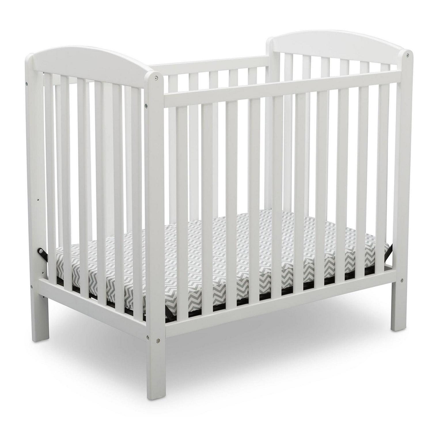 Delta Children Gateway Mini Convertible Baby Crib with 2.75-inch Mattress. Bianca White
