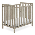 Delta Children Middleton Mini Baby Crib & Mattress. Textured Limestone